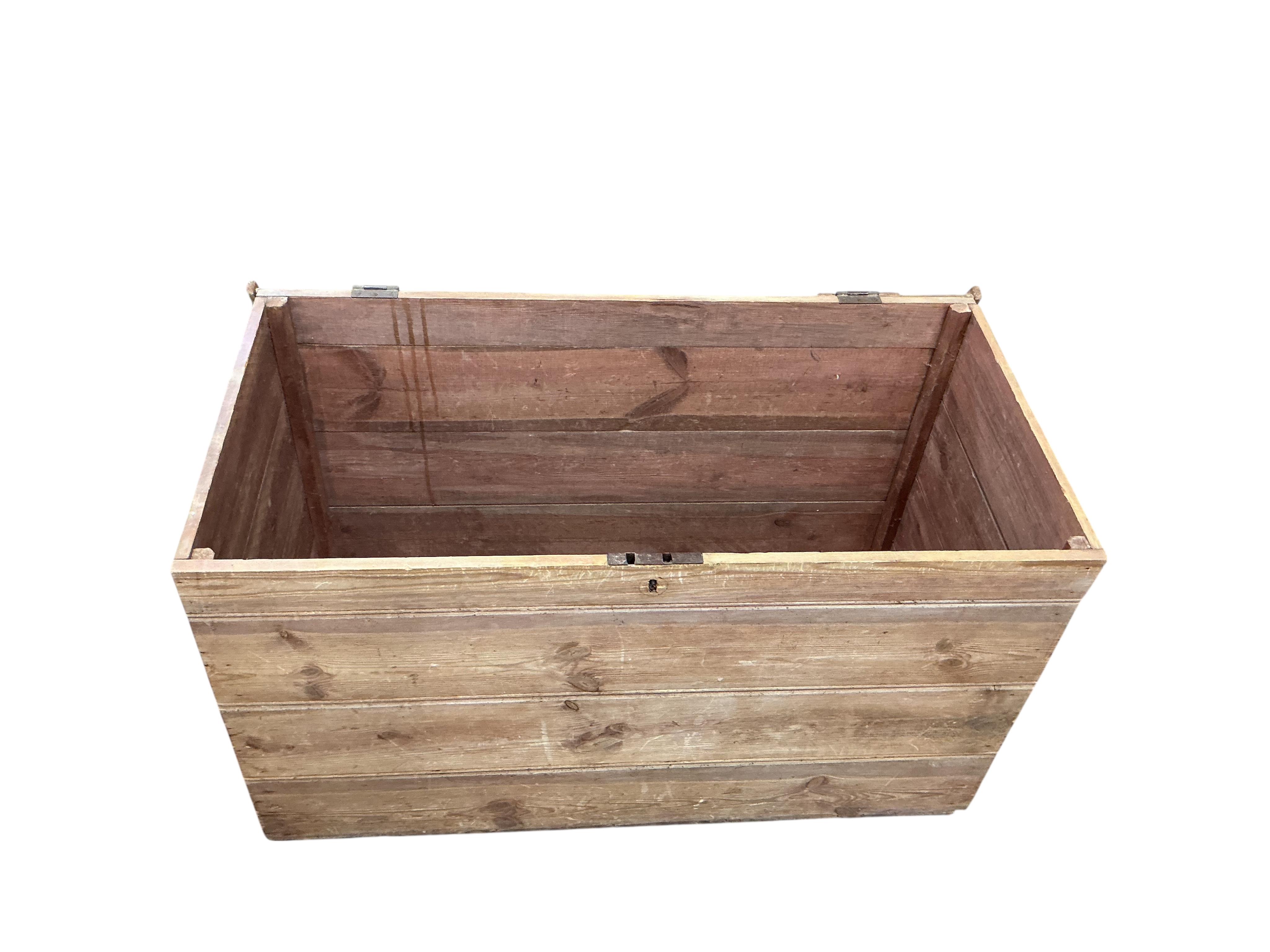 A Victorian pine trunk, width 105cm, depth 53cm, height 59cm